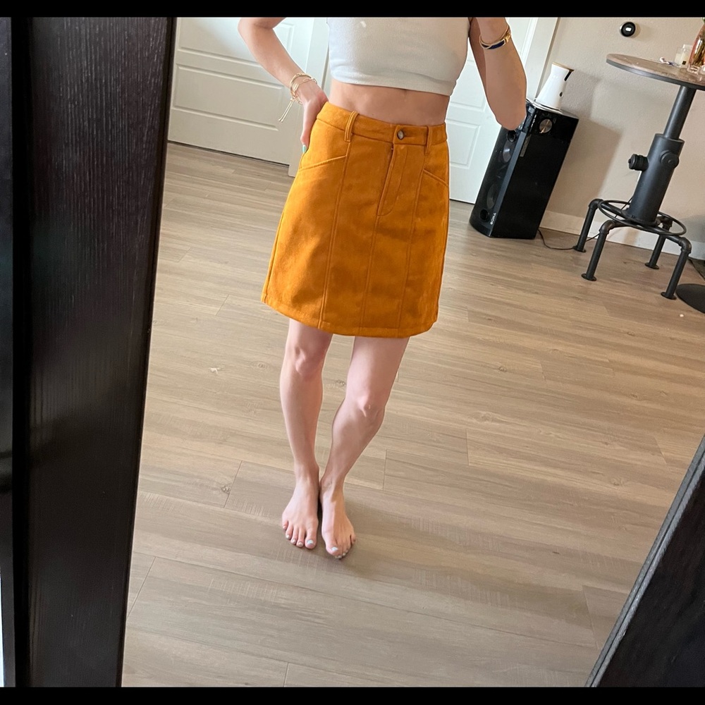 Never been worn French Connection velvet skirt in Burnt orange.
